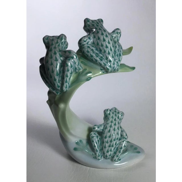 Another Distinctive piece of Porcelain from Herend of Hungary. These inquisitive Tree Frogs will add whimsy and interest...