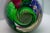 A captivating contemporary pink, purple, and green swirl design glass art sculpture by Berry Davis. Etched signature on...