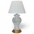 A handblown vasiform art glass table lamp In swirling white and clear, resting upon a brass base and having a new pleated...