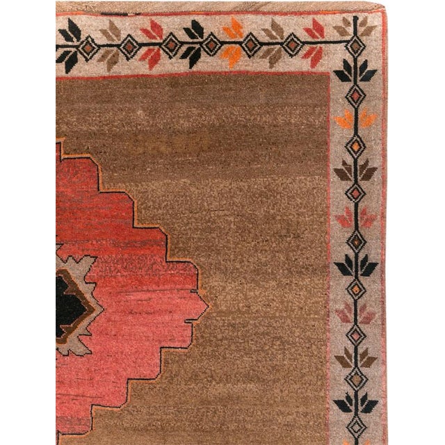 A vintage Turkish Anatolian room size carpet handmade during the Mid-20th Century. Measures: 8' 11" x 12' 0".
