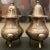 Striking pair of plated brass salt and pepper shakers. We love the feet and unique bulbous form. Original "Made in India"...