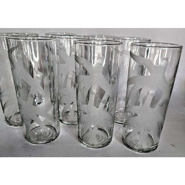 These are gorgeous, true mixed drink highballs. Not a simple tumbler, but a tall elegant highball. The bamboo shoots and...
