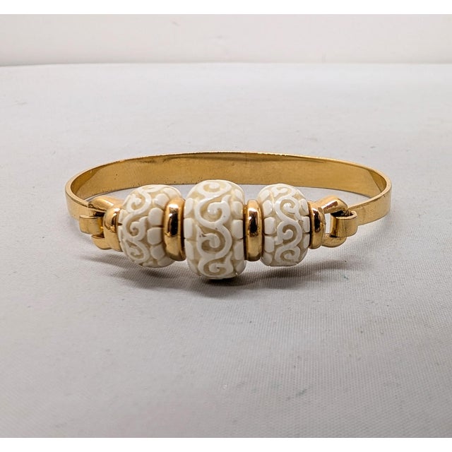 Trifari Vintage Signed Crown Trifari Goldtone Carved Faux-Ivory Cuff Bracelet For Sale - Image 4 of 12