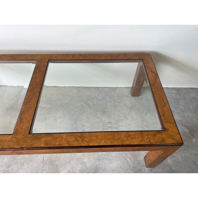 A stunning Mid-century burlwood rectangular coffee or cocktail table by John Widdicomb. Stunning burl wood, with two inset...