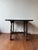 Crafted from rich, antique walnut, this dining table combines timeless elegance with durable construction. Its solid wood...