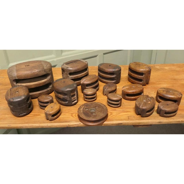A Collection of 19th Century Vintage Oak and Ash Ships Blocks This is a collection of 18 ships blocks and pulleys, all in...