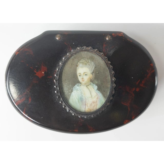 We are selling this nice little faux tortoise shell snuff box. This papier mache snuff box has painted surface to imitate...