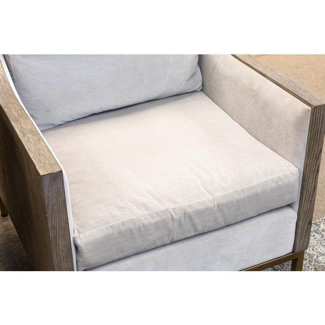A pair of Century Furniture "Monarch" armchairs. This gorgeous pair of accent armchairs feature a wrap around wood frame...