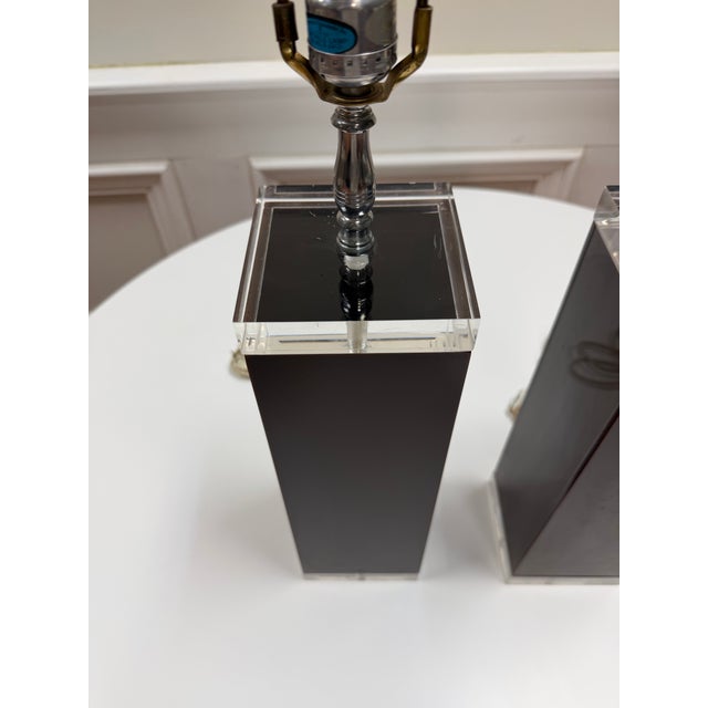 Infuse your space with dramatic, Space Age geometric allure with this striking pair of 1970s modernist block table lamps,...