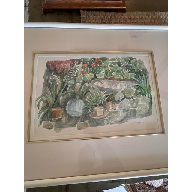 Original watercolor on paper by American artist Judith Bledsoe (1938–2013), titled “The Garden II.” This charming garden...