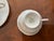Beautiful set of eight tea cups and saucers from the Avery collection by Royal Calden made in England. The distinctive...