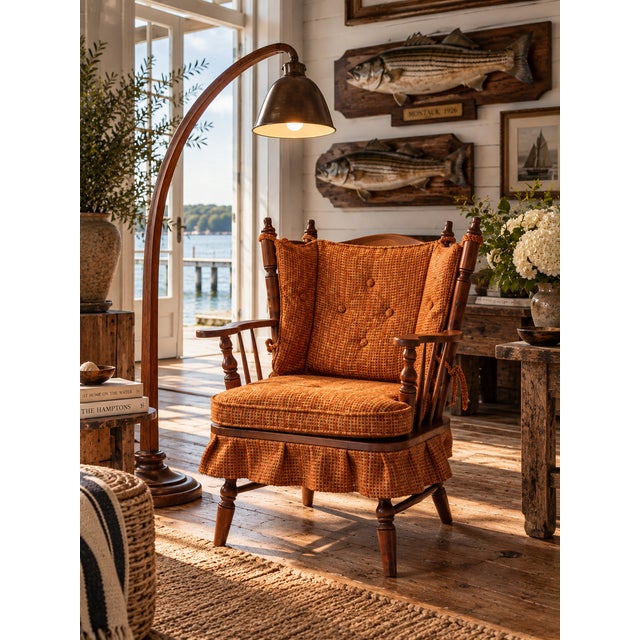 A mid-century spring rocking chair in the Colonial Revival tradition, with a beautifully articulated wood frame and strong...