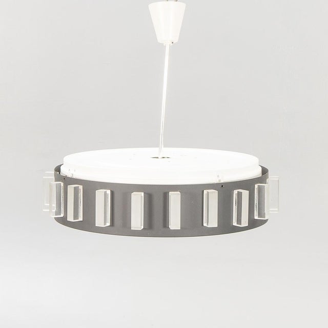Unseen metal and acrylic glass ceiling light, made in Sweden in the 70s. Good general condition. European Plug (up to...
