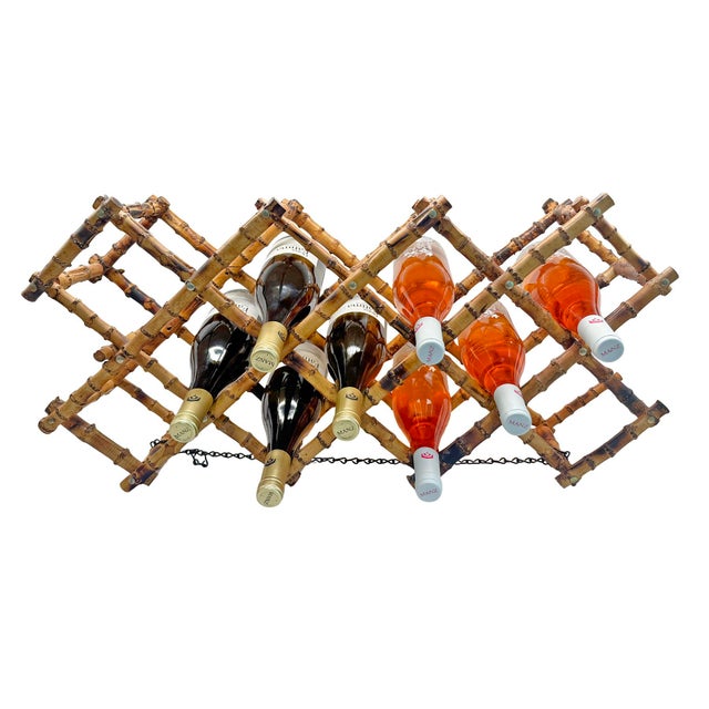 Bring warmth and vintage character to your bar, kitchen, or dining space with this beautiful vintage expandable bamboo...