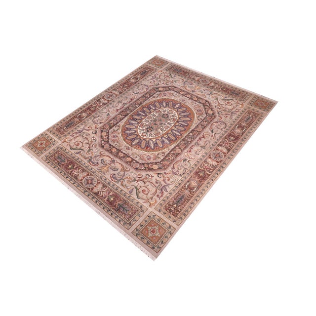 Designed with mesmerizing intricacy and gorgeous color palette, this hand-knotted masterpiece demonstrates the beauty and...