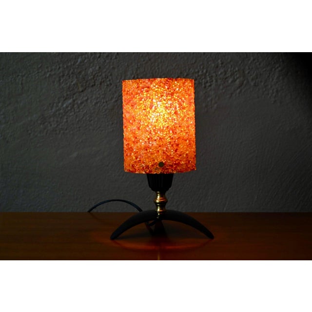 What a little marvel this vintage table lamp is, straight out of the 1960s and their futuristic vision! Its cylindrical...