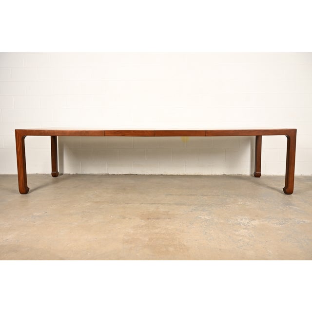 A gorgeous mid-century modern Hollywood Regency Chinoiserie extension dining table By Henredon USA, Circa 1970s Carved...