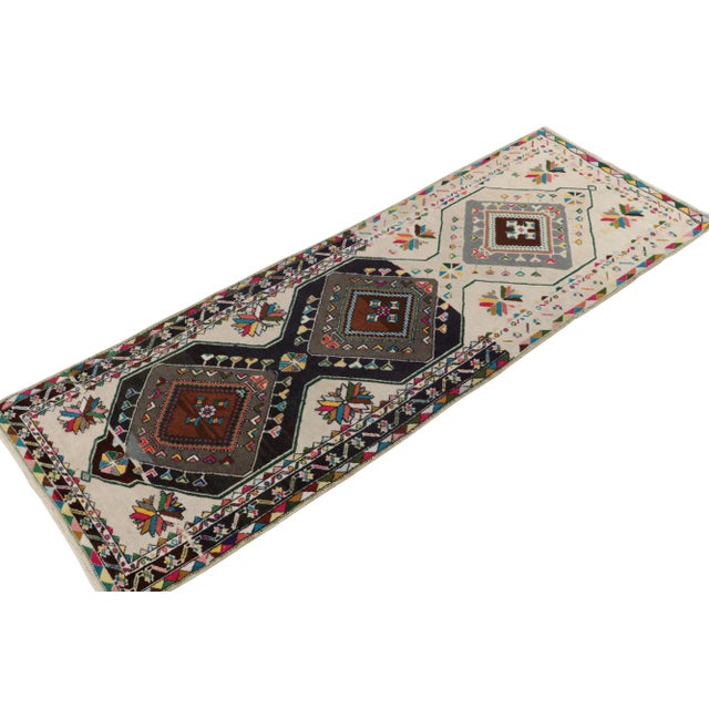 Originating from Turkey circa 1950-1960, a fabulously rare mid-century rug from our principal’s newest line of vintage...