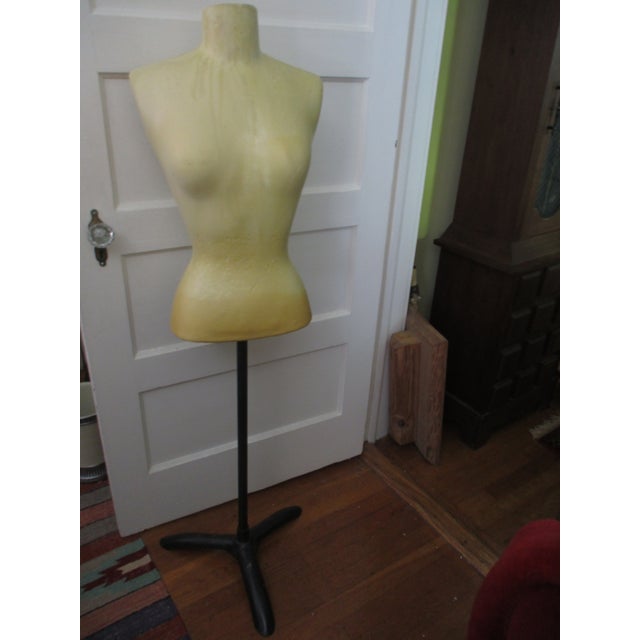 This is a Vintage Mannequin With Black Metal Base and a Molded Hard Body that I am not sure what it is and comes with a...