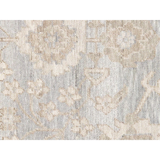 Meet Pasargad Home Oushak hand-knotted Rug, upholding a timeless, elegant style of design that has been the centerpiece of...