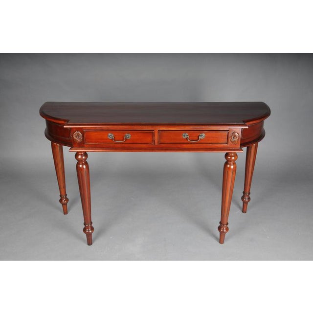 Beautiful classic English sideboard/wall console, mahogany Solid mahogany wood. This wall console features a neoclassical...