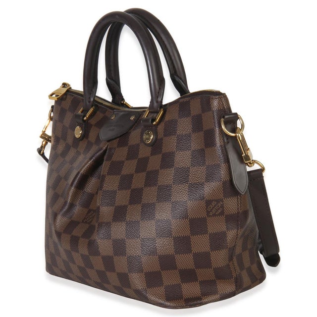 Item #: 152424 Exterior Material: Canvas MSRP: 1,750 Interior Material: Fabric Size: PM Features Interior: Three slip...