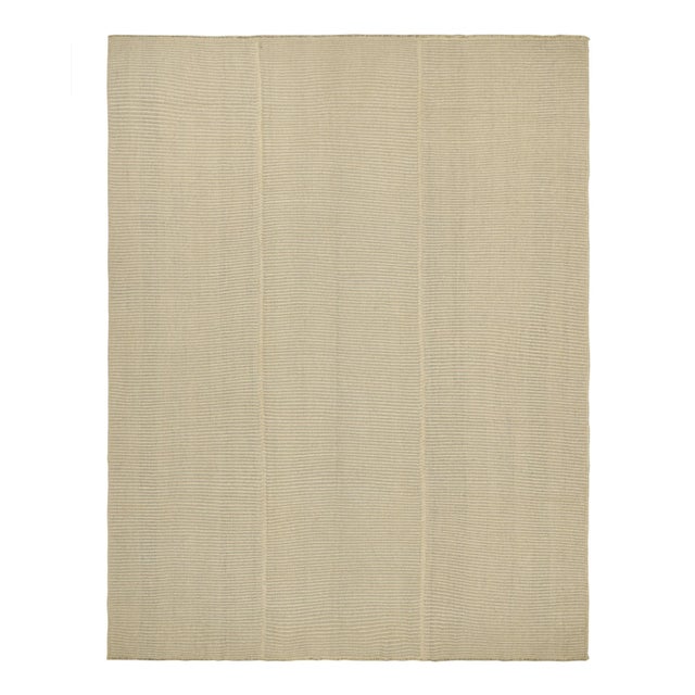 Handwoven in wool, a 10x13 Kilim design from an inventive new contemporary flat weave collection by Rug & Kilim. On the...