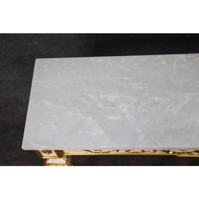This elegant Neoclassical paint-decorated console table is a refined expression of timeless European design, combining...