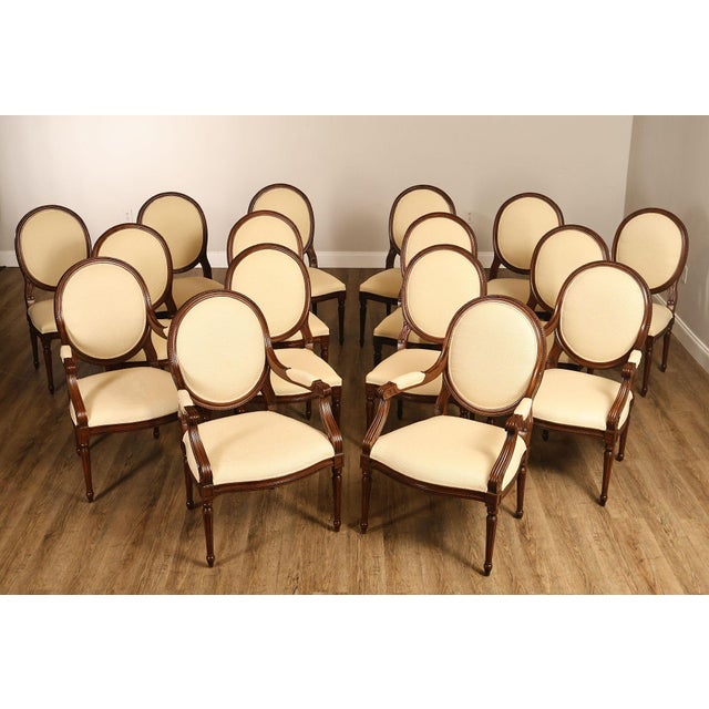 High Quality Set Of 16 French Louis XVI Style Dining Chairs Including Twelve Side Chairs And Four Armchairs. Features Oval...