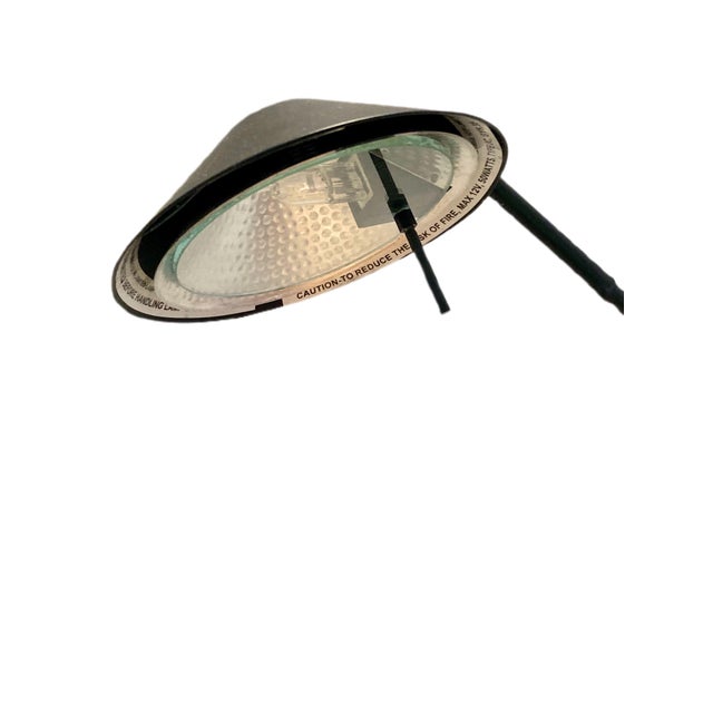 A feather floor lamp designed by Robert Sonneman for George Kovacs in 1988. The lamp is a cantilevered and adjustable...