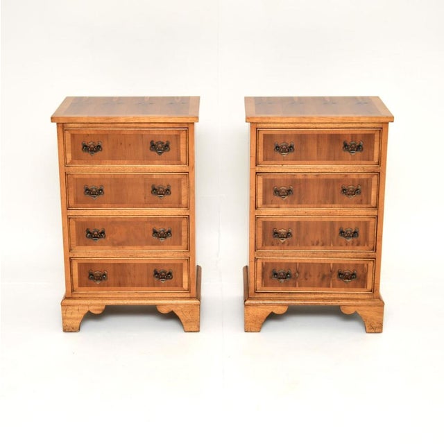 A lovely pair of antique Georgian style yew wood bedside chests. They were made in England, they date from around the...