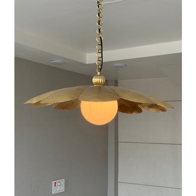 Bring timeless elegance and artisan craftsmanship into your home with this handcrafted Pure Brass Pendant Light. Designed...