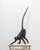 A striking large-scale modernist monkey sculpture, cast in solid bronze and defined by its elongated limbs and dynamic,...