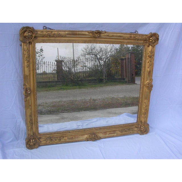 Mirror carved in lime wood gilded with pure gold, late 1800s
