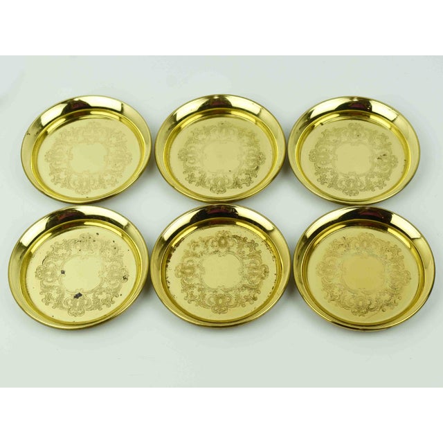 Each coaster is made from high-quality solid brass, featuring intricate filigree patterns that evoke a sense of luxury and...