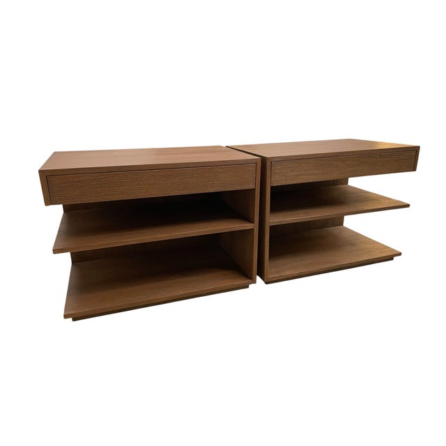 A pair of left and right facing mid-century style nightstands from Brownstone Furniture. Style name: "Laguna" Teak wood...