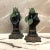 This is a pair of Italian neo-classical style metal tole hand form candlesticks . Each hand is holding a leaf branch. They...