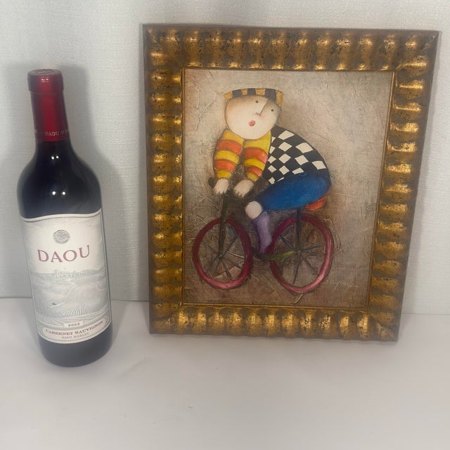 This hand-painted piece perfectly captures the whimsical aesthetic popularized by iconic mid-century artist Graciela Rodo...