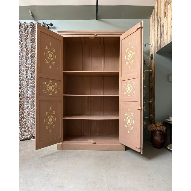 Born from the tradition of french folk craftsmanship, this antique painted wardrobe is a unique and instantly captivating...