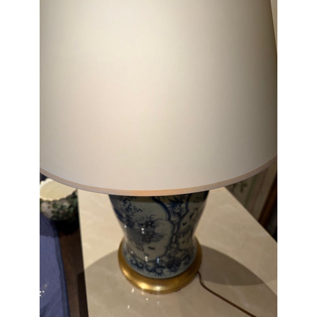 Vintage urn that was converted into a lamp base by a professional electrician. Harp and Shade included. There is a second...