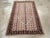 This Early 20th century Turkish Ghiordes rug, measuring 3' 6" x 5' 4", showcases the distinctive village weaving...