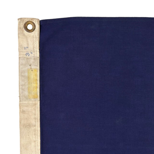 This vintage flag of Vermont is made from a cotton cloth with printed design visible on both sides. Please note staining...