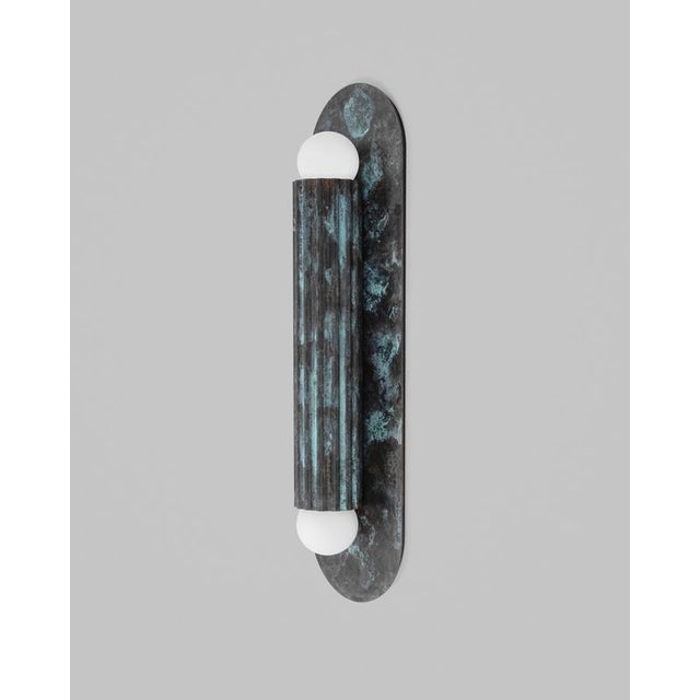 Vesta md wall sconce by schwung dimensions: ø 10,5 x h 38 cm materials: triplex opax transparent glass, lacquered...