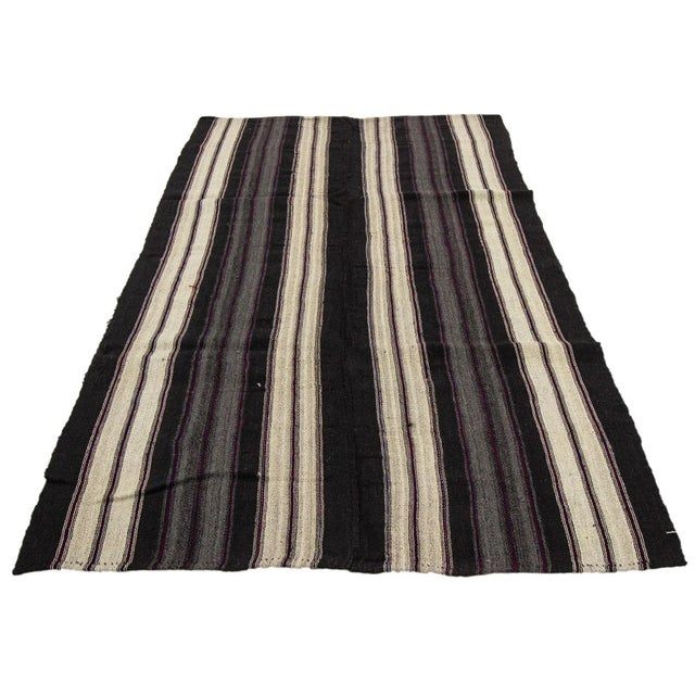 Vintage handwoven kilim rug from Afyon region of Turkey. Approximately 50-60 years old. In very good condition