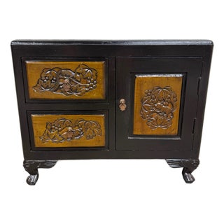 Vintage Asian Carved Cabinet With Hand Carved Motifs For Sale