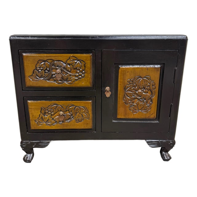 Vintage Asian Carved Cabinet With Hand Carved Motifs For Sale