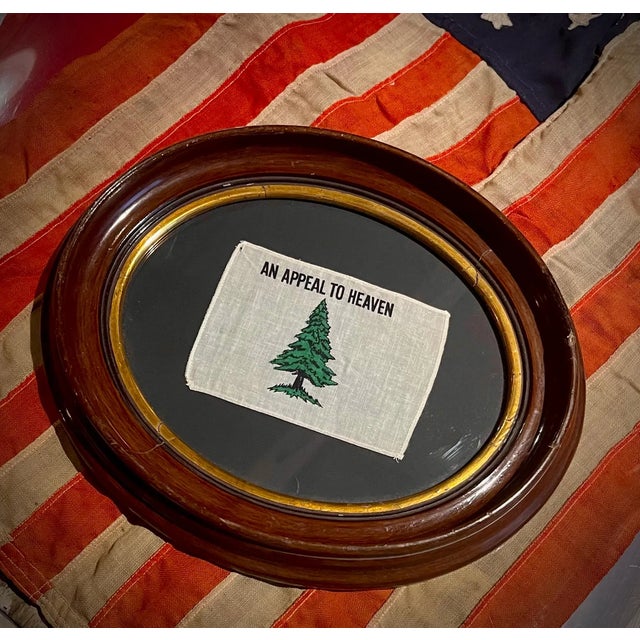 Late 20th century parade flag, cotton Framed in a beautiful 1880’s walnut oval frame featuring its original 19th century...