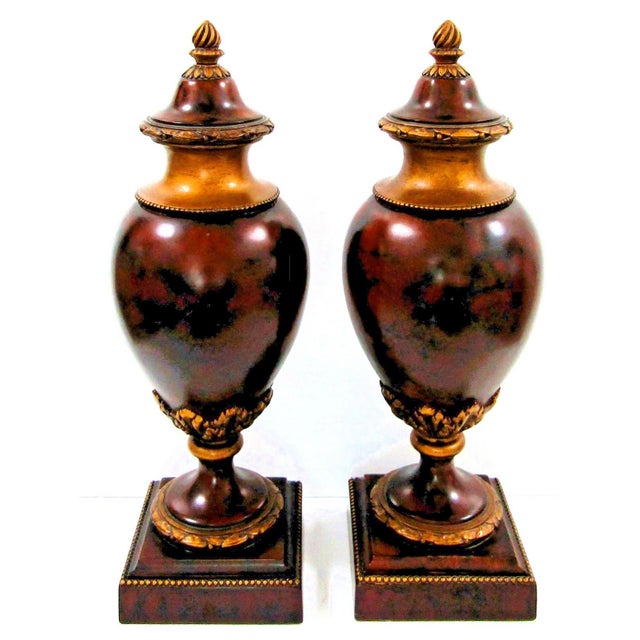 This product is a pair of medium-sized Moroccan Burr Theya turned wood urns in a brown color. They are decorated in the...