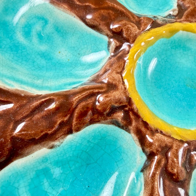 A six-well Majolica glazed oyster plate by S. Fielding & Co. Ltd., Stoke-on-Trent, England, circa 1878. Turquoise oyster...