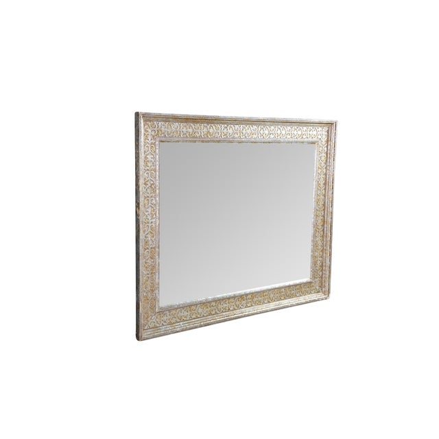 This Closson's vintage wall mirror features a large, rectangular clear glass panel enclosed by a wide, elaborately...